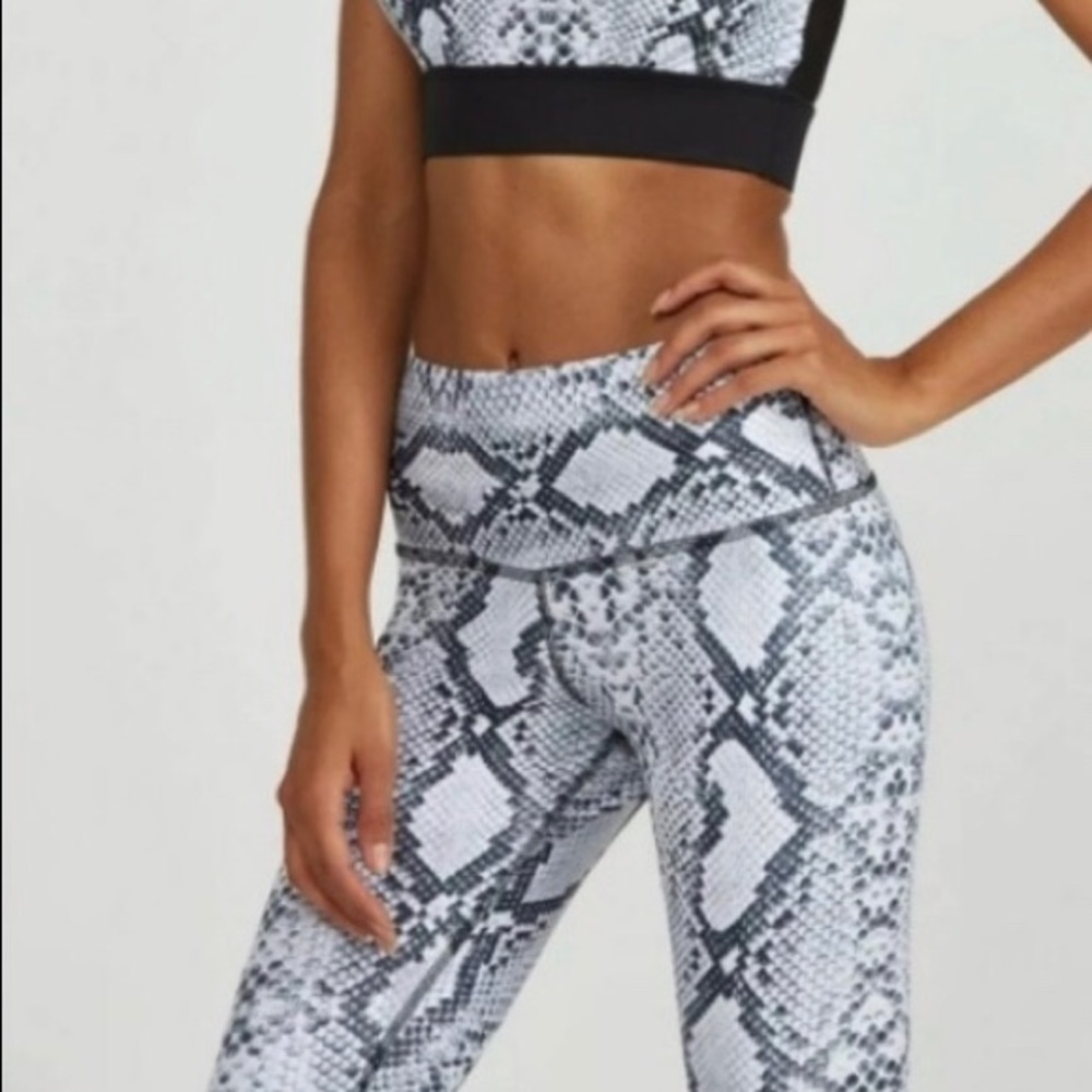 Noli python leggings never worn size small.